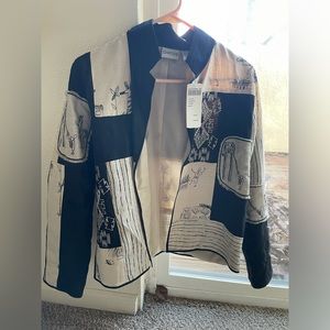 Brand new Chicos blazer. Size: 0/Small. Black/Tan